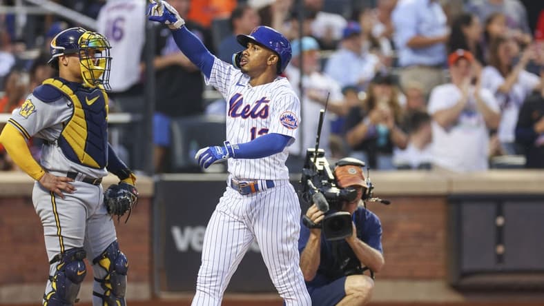Jun 27, 2023; New York City, New York, USA; New York Mets shortstop Francisco Lindor (12) celebrates after his solo home run during the fourth inning against the Milwaukee Brewers at Citi Field. Mandatory Credit: Vincent Carchietta-USA TODAY Sports