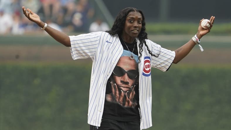 Jun 27, 2023; Chicago, Illinois, USA; Chicago Sky s WNBA player Kahleah Copper throws a ceremonial first pitch before the game between the Chicago Cubs and the Philadelphia Phillies at Wrigley Field. Mandatory Credit: David Banks-USA TODAY Sports
