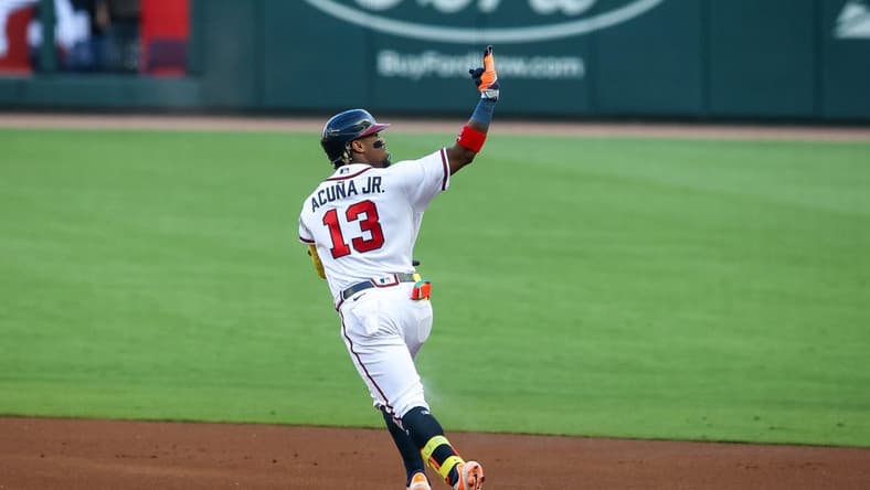 Jun 27, 2023; Atlanta, Georgia, USA; Atlanta Braves right fielder Ronald Acuna Jr. (13) reacts after a home run against the Minnesota Twins in the first inning at Truist Park. Mandatory Credit: Brett Davis-USA TODAY Sports