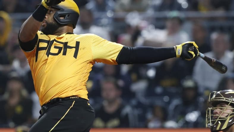 Jun 27, 2023; Pittsburgh, Pennsylvania, USA; Pittsburgh Pirates first baseman Carlos Santana (41) hits a RBI single against the San Diego Padres during the sixth inning at PNC Park. Mandatory Credit: Charles LeClaire-USA TODAY Sports