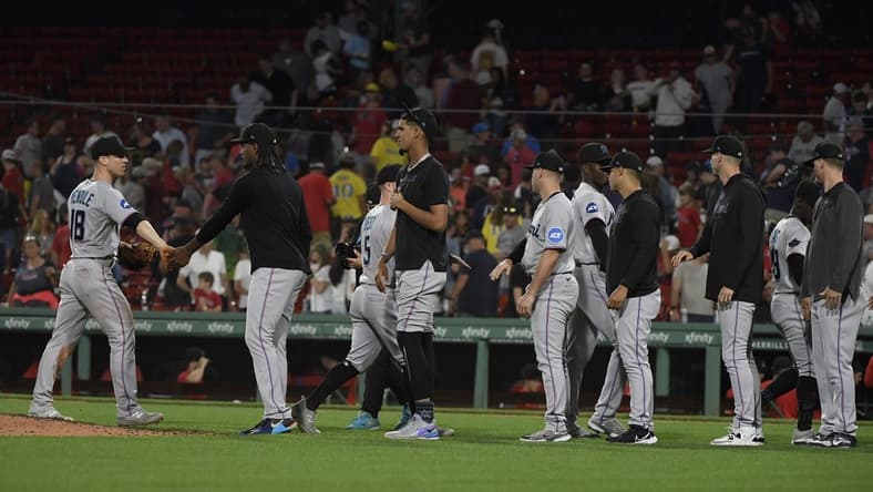Jun 27, 2023; Boston, Massachusetts, USA; The Miami Marlins celebrate after defeating the Boston Red Sox at Fenway Park. Mandatory Credit: Bob DeChiara-USA TODAY Sports