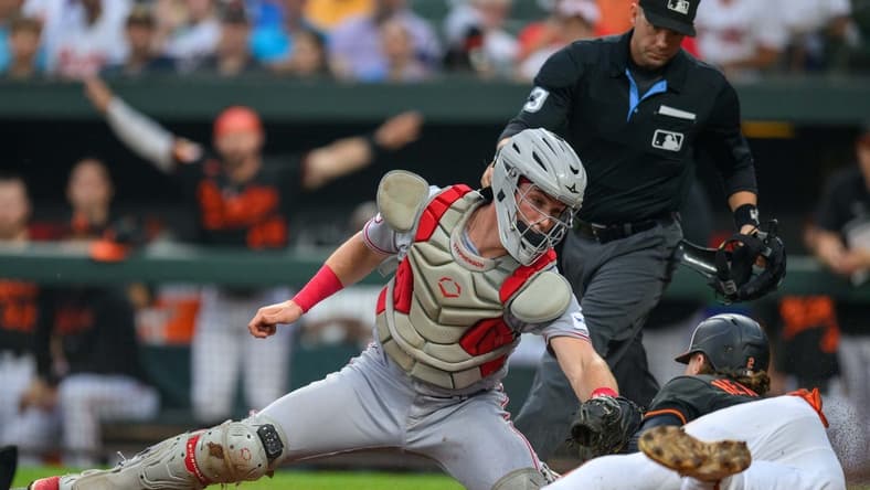 Jun 28, 2023; Baltimore, Maryland, USA; Cincinnati Reds catcher Tyler Stephenson (37) tags out Baltimore Orioles third baseman Gunnar Henderson (2) attempting to score at home plate during the first inning at Oriole Park at Camden Yards. Mandatory Credit: Reggie Hildred-USA TODAY Sports