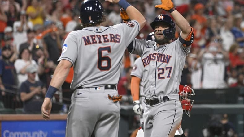 Jun 28, 2023; St. Louis, Missouri, USA; Houston Astros second baseman Jose Altuve (27) is congratulated by Houston Astros center fielder Jake Meyers (6) after Altuve hits a three-run home run against the St. Louis Cardinals in the eighth inning at Busch Stadium. Mandatory Credit: Joe Puetz-USA TODAY Sports