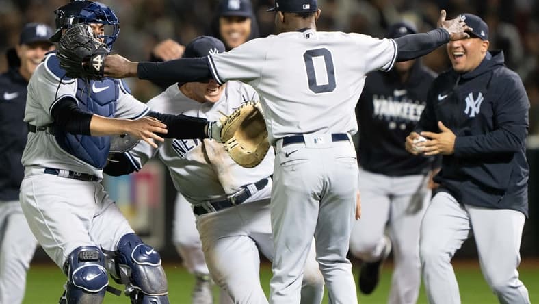 Jun 28, 2023; Oakland, California, USA; New York Yankees starting pitcher Domingo German (0) celebrates with teammates after pitching a perfect game against the Oakland Athletics at Oakland-Alameda County Coliseum. It was the first perfect game in MLB since 2012 and the fourth perfect game in franchise history. Mandatory Credit: Stan Szeto-USA TODAY Sports