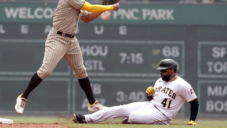 Jun 29, 2023; Pittsburgh, Pennsylvania, USA; San Diego Padres shortstop Xander Bogaerts (2) throws to first base after a force out of Pittsburgh Pirates first baseman Carlos Santana (41) at second base during the second inning at PNC Park. Mandatory Credit: Charles LeClaire-USA TODAY Sports