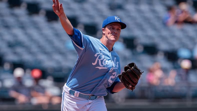Jun 29, 2023; Kansas City, Missouri, USA; Kansas City Royals starting pitcher Zack Greinke (23) throws to first base during the second inning against the Cleveland Guardians at Kauffman Stadium. Mandatory Credit: William Purnell-USA TODAY Sports