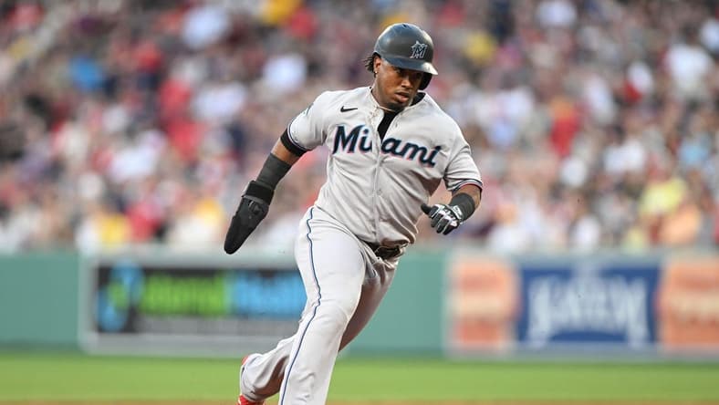 Jun 29, 2023; Boston, Massachusetts, USA; Miami Marlins third baseman Jean Segura (9) runs towards third base during the eighth inning of a game against the Boston Red Sox at Fenway Park. Mandatory Credit: Brian Fluharty-USA TODAY Sports