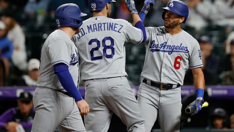 Jun 29, 2023; Denver, Colorado, USA; Los Angeles Dodgers designated hitter J.D. Martinez (28) celebrates his two run home run with left fielder David Peralta (6) and third baseman Max Muncy (13) in the fourth inning against the Colorado Rockies at Coors Field. Mandatory Credit: Isaiah J. Downing-USA TODAY Sports