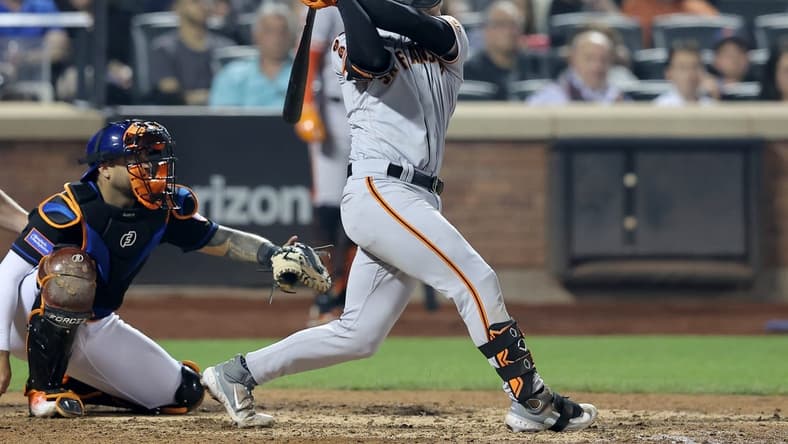Jun 30, 2023; New York City, New York, USA; San Francisco Giants catcher Patrick Bailey (14) follows through on a three run home run against the New York Mets during the eighth inning at Citi Field. Mandatory Credit: Brad Penner-USA TODAY Sports