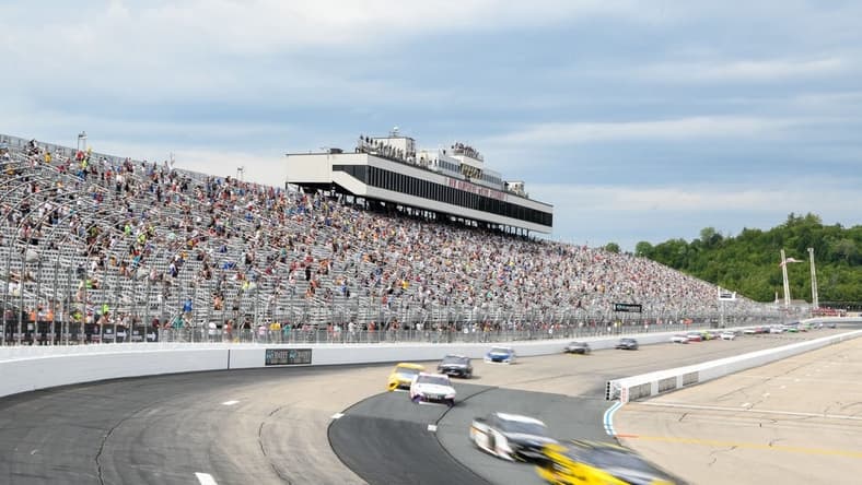 Aug 2, 2020; Loudon, New Hampshire, USA; NASCAR Cup Series driver Brad Keselowski (2) leads the field into turn one at the New Hampshire Motor Speedway. Mandatory Credit: Brian Fluharty-USA TODAY Sports