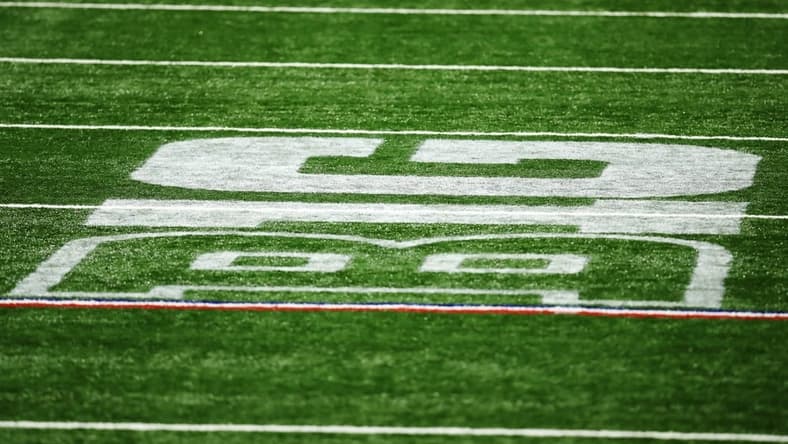 Dec 19, 2020; Indianapolis, Indiana, USA; The Big 10 Conference logo is seen on the field during the first half between the Ohio State Buckeyes and the Northwestern Wildcats at Lucas Oil Stadium. Mandatory Credit: Aaron Doster-USA TODAY Sports