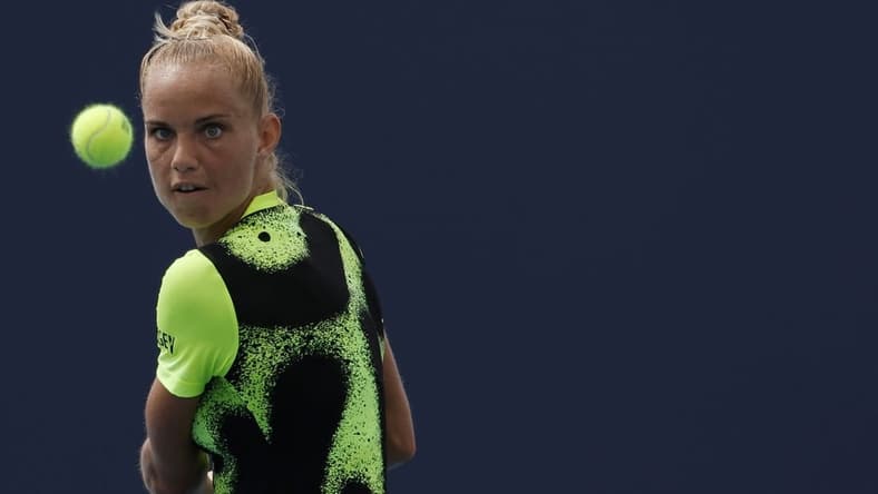 Mar 22, 2022; Miami Gardens, FL, USA; Arantxa Rus of Netherlands hits a backhand against Heather Watson of Great Britain (not pictured) in a first round women's singles match in the Miami Open at Hard Rock Stadium. Mandatory Credit: Geoff Burke-USA TODAY Sports