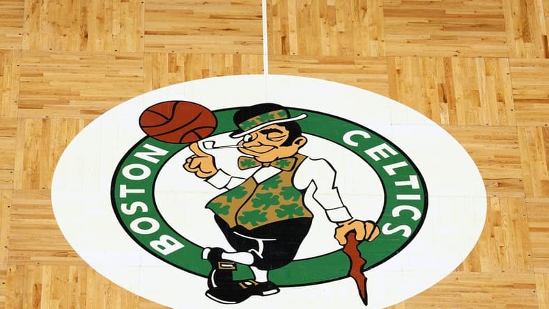 Apr 3, 2022; Boston, Massachusetts, USA; The Boston Celtics logo is seen on the parquet floor at center court before the game between the Boston Celtics and the Washington Wizards at TD Garden. Mandatory Credit: Winslow Townson-USA TODAY Sports