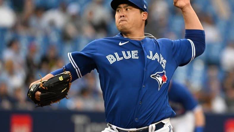 Jun 1, 2022; Toronto, Ontario, CAN; Toronto Blue Jays starting pitcher Hyun Jin Ryu (990 delivers a pitch against the Chicago White Sox in the second inning at Rogers Centre. Mandatory Credit: Dan Hamilton-USA TODAY Sports