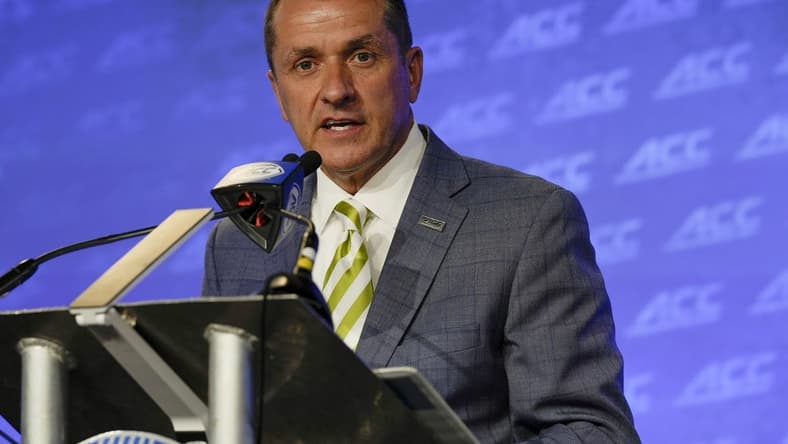 Jul 20, 2022; Charlotte, NC, USA; ACC commissioner Jim Phillips speaks to the media during ACC Media Days at the Westin Hotel in Charlotte. Mandatory Credit: Jim Dedmon-USA TODAY Sports