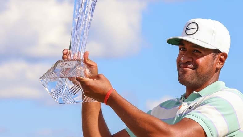 Jul 24, 2022; Blaine, Minnesota, USA; Tony Finau poses with the trophy after winning the 3M Open golf tournament. Mandatory Credit: Matt Krohn-USA TODAY Sports