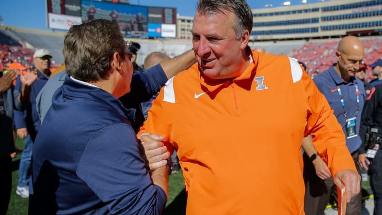 Illinois head coach Bret Bielema celebrates with a supporter as he heads to the locker room after a game against Wisconsin on Saturday, October 1, 2022, at Camp Randall Stadium in Madison, Wis. Illinois won the game, 34-10, in Bielema s return to Madison after coaching the Badgers from 2006-2012.Tork Mason/USA TODAY NETWORK-Wisconsin
Usat Wisconsin Vs Illinois Football 100122 2932 Ttm