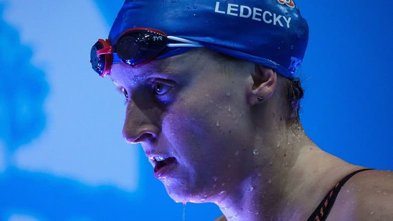Nov 4, 2022; Indianapolis, IN, USA; United States Katie Ledecky walks off the pool deck after competing in the 200 meter freestyle swim during the FINA Swimming World Cup finals on Friday, Nov 4, 2022; Indianapolis, IN, USA;  at Indiana University Natatorium. Mandatory Credit: Grace Hollars-USA TODAY Sports