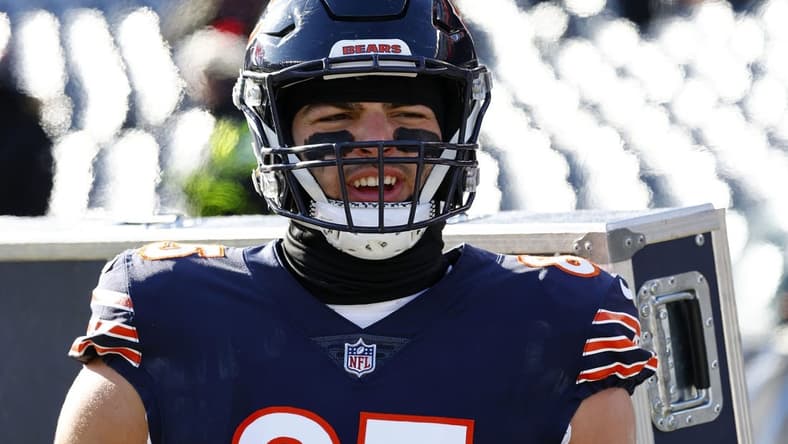 Dec 24, 2022; Chicago, Illinois, USA; Chicago Bears tight end Cole Kmet (85) stands by the heaters along the sideline before the game against the Buffalo Bills at Soldier Field. Mandatory Credit: Mike Dinovo-USA TODAY Sports