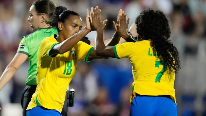 Feb 22, 2023; Frisco, Texas, USA; Brazil forward Ludmila (7) celebrates with forward Geyse (18) after scoring a goal during the second half at Toyota Stadium. Mandatory Credit: Chris Jones-USA TODAY Sports
