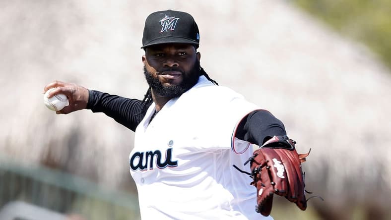 Feb 26, 2023; Jupiter, Florida, USA; Miami Marlins starting pitcher Johnny Cueto (47) throws out St. Louis Cardinals Jose Fermin (35) in the second inning at Roger Dean Stadium. Mandatory Credit: Rhona Wise-USA TODAY Sports