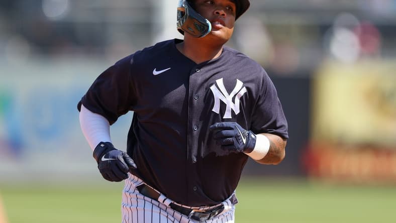 Mar 4, 2023; Tampa, Florida, USA;  New York Yankees outfielder Willie Calhoun (24)  runs the bases after hitting  a home run against the Tampa Bay Rays in the third inning during spring training at George M. Steinbrenner Field. Mandatory Credit: Nathan Ray Seebeck-USA TODAY Sports