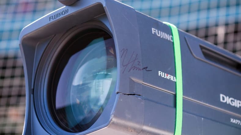 Mar 26, 2023; Mesa, Arizona, USA; A detailed view of a cracked TV camera signed by Chicago Cubs infielder Nico Hoerner (2) after a foul ball he hit hit the camera during a spring training game against the Kansas City Royals at Sloan Park. Mandatory Credit: Allan Henry-USA TODAY Sports