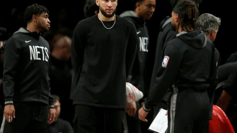 Mar 31, 2023; Brooklyn, New York, USA; Brooklyn Nets injured guard Ben Simmons (10) during a time out during the third quarter against the Atlanta Hawks at Barclays Center. Mandatory Credit: Brad Penner-USA TODAY Sports