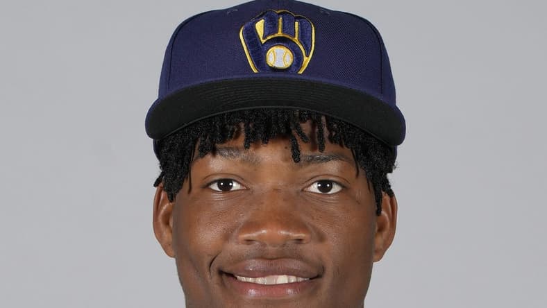 Feb 22, 2023; Phoenix, AZ, USA; Milwaukee Brewers pitcher Abner Uribe (73) poses for photo day at American Family Fields. Mandatory Credit: Rick Scuteri-USA TODAY Sports