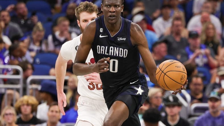 Apr 6, 2023; Orlando, Florida, USA; Orlando Magic center Bol Bol (10) brings the ball up court during the second half against the Cleveland Cavaliers at Amway Center. Mandatory Credit: Mike Watters-USA TODAY Sports