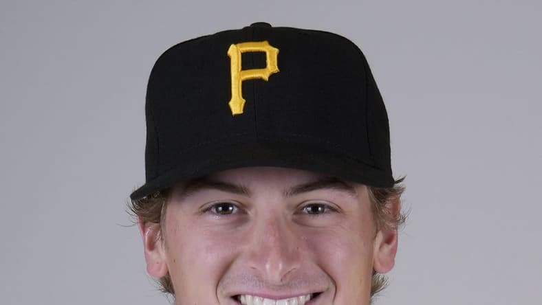 Feb 22, 2023; Bradenton, FL, USA; Pittsburgh Pirates pitcher Quinn Priester (64) poses for photos during Media Day. Mandatory Credit: Dave Nelson-USA TODAY Sports