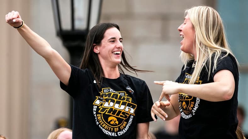 Iowa guard Caitlin Clark, left, celebrates with teammate center Monika Czinano during a ceremony honoring the women's basketball team, Friday, April 14, 2023, at the Pentacrest in Iowa City, Iowa.

230414 Iowa Wbb Ceremony 023 Jpg