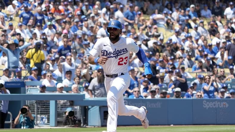 Apr 19, 2023; Los Angeles, California, USA; Los Angeles Dodgers right fielder Jason Heyward (23) scores in the fourth inning against the New York Mets at Dodger Stadium. Mandatory Credit: Kirby Lee-USA TODAY Sports