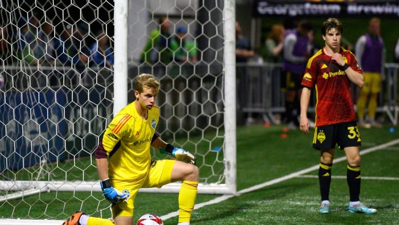 Apr 26, 2023; Tukwila, WA, USA; Seattle Sounders goalkeeper Stefan Cleveland (30) guards the ball during the game against the San Diego Loyal at Starfire Sports. Mandatory Credit: Steven Bisig-USA TODAY Sports
