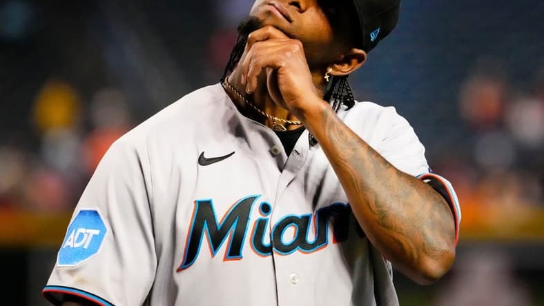 Miami Marlins starting pitcher Edward Cabrera (27) reacts after leaving the game against the Arizona Diamondbacks in the fourth inning at Chase Field in Phoenix on May 10, 2023.