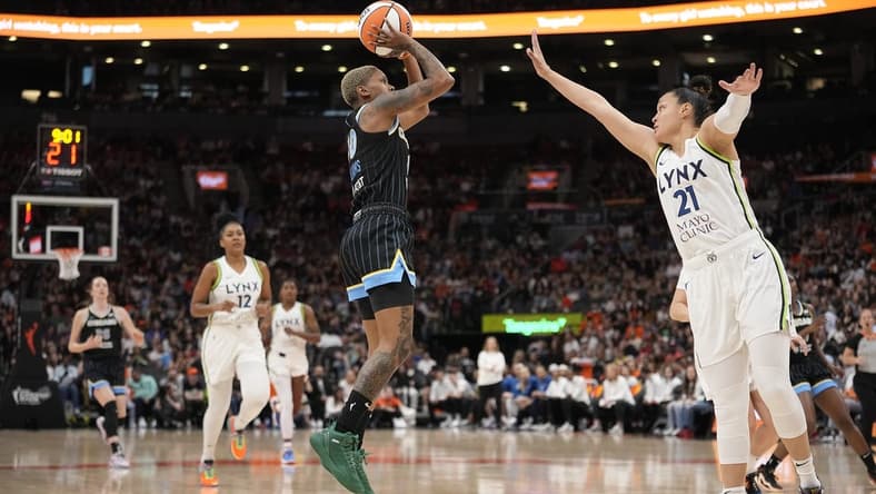 May 13, 2023; Toronto, Ontario, Canada; Minnesota Lynx guard Kayla McBride (21) goes to block a shot by Chicago Sky guard Courtney Williams (10) during the first half at Scotiabank Arena. Mandatory Credit: John E. Sokolowski-USA TODAY Sports