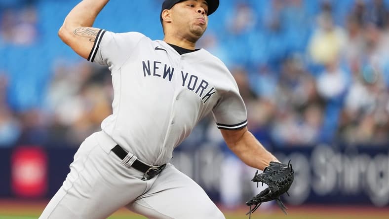 May 15, 2023; Toronto, Ontario, CAN; New York Yankees starting pitcher Jimmy Cordero (70) throws a pitch against the Toronto Blue Jays during the first inning at Rogers Centre. Mandatory Credit: Nick Turchiaro-USA TODAY Sports