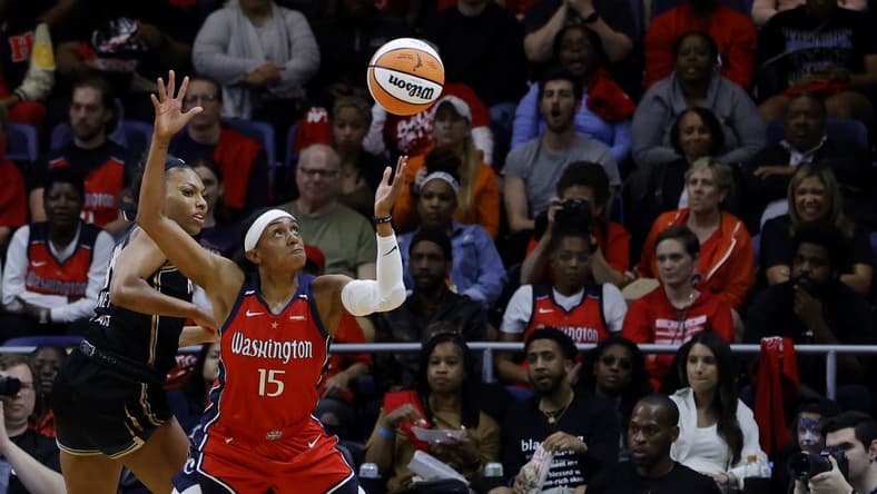 May 19, 2023; Washington, District of Columbia, USA; Washington Mystics guard Brittney Sykes (15) and New York Liberty forward Betnijah Laney (44) battles for the ball at Entertainment & Sports Arena. Mandatory Credit: Geoff Burke-USA TODAY Sports
