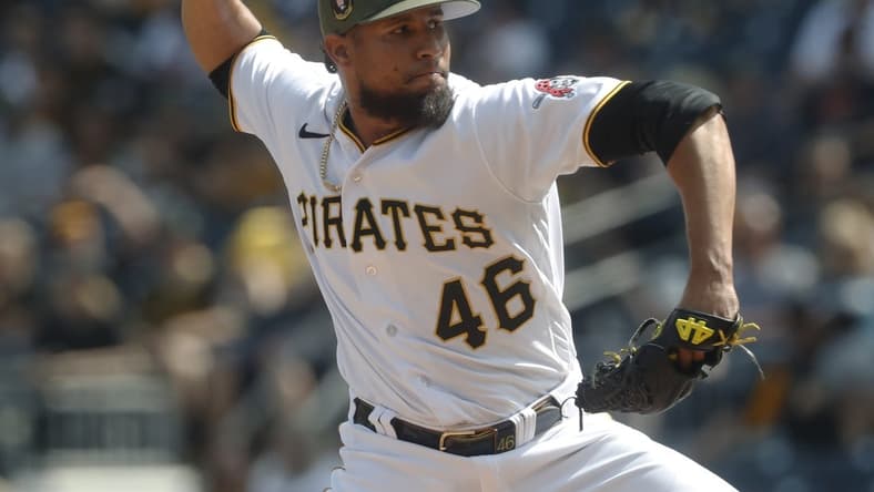 May 21, 2023; Pittsburgh, Pennsylvania, USA; Pittsburgh Pirates relief pitcher Yohan Ramirez (46) pitches against the Arizona Diamondbacks during the eighth inning at PNC Park. Arizona won 8-3. Mandatory Credit: Charles LeClaire-USA TODAY Sports