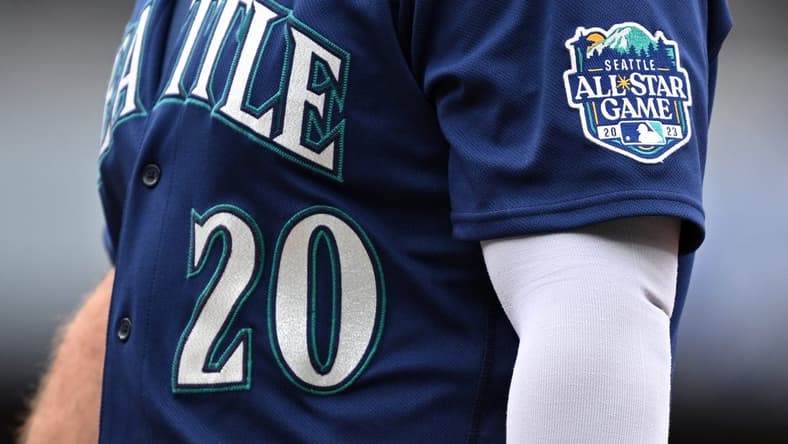 Jun 7, 2023; San Diego, California, USA; A detailed view of the 2023 Seattle All-Star Game patch on the uniform of Mariners designated hitter Mike Ford (20) during the eighth inning against the San Diego Padres at Petco Park. Mandatory Credit: Orlando Ramirez-USA TODAY Sports