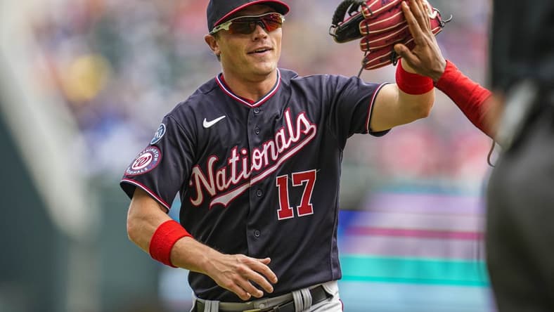 Jun 11, 2023; Cumberland, Georgia, USA; Washington Nationals center fielder Alex Call (17) reacts after making a leaping catch to take a hit away from Atlanta Braves center fielder Michael Harris II (23) (not shown) during the sixth inning at Truist Park. Mandatory Credit: Dale Zanine-USA TODAY Sports