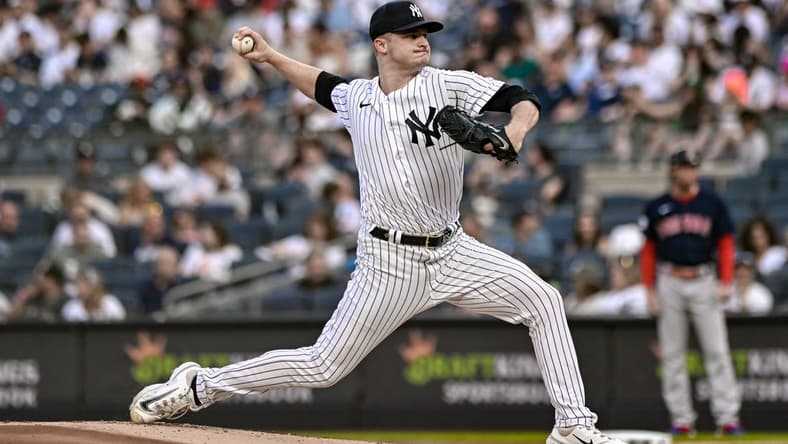 Jun 11, 2023; Bronx, New York, USA; New York Yankees starting pitcher Clarke Schmidt (36) pitches against the Boston Red Sox during the first inning at Yankee Stadium. Mandatory Credit: John Jones-USA TODAY Sports