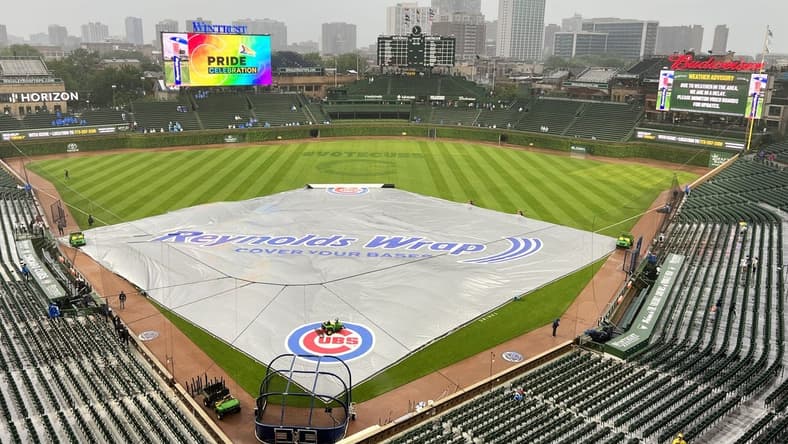 Jun 13, 2023; Chicago, Illinois, USA; A tarp sits on the field. The game between the Chicago Cubs and the Pittsburgh Pirates is delayed due to rain at Wrigley Field. Mandatory Credit: David Banks-USA TODAY Sports