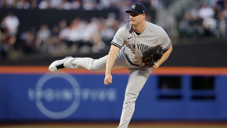 Jun 14, 2023; New York City, New York, USA; New York Yankees starting pitcher Gerrit Cole (45) follows through on a pitch against the New York Mets during the second inning at Citi Field. Mandatory Credit: Brad Penner-USA TODAY Sports