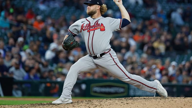 Jun 12, 2023; Detroit, Michigan, USA;  Atlanta Braves relief pitcher A.J. Minter (33) pitches against the Detroit Tigers at Comerica Park. Mandatory Credit: Rick Osentoski-USA TODAY Sports