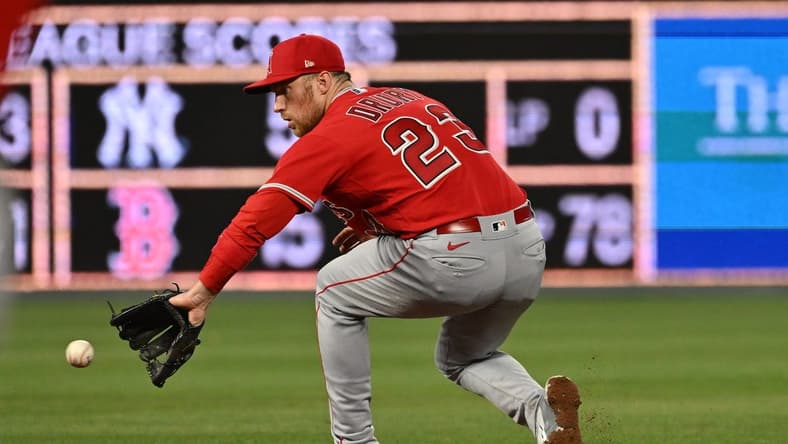 Jun 16, 2023; Kansas City, Missouri, USA; Los Angeles Angels second baseman Brandon Drury (23) fields a ground ball in the ninth inning against the Kansas City Royals at Kauffman Stadium. Mandatory Credit: Peter Aiken-USA TODAY Sports