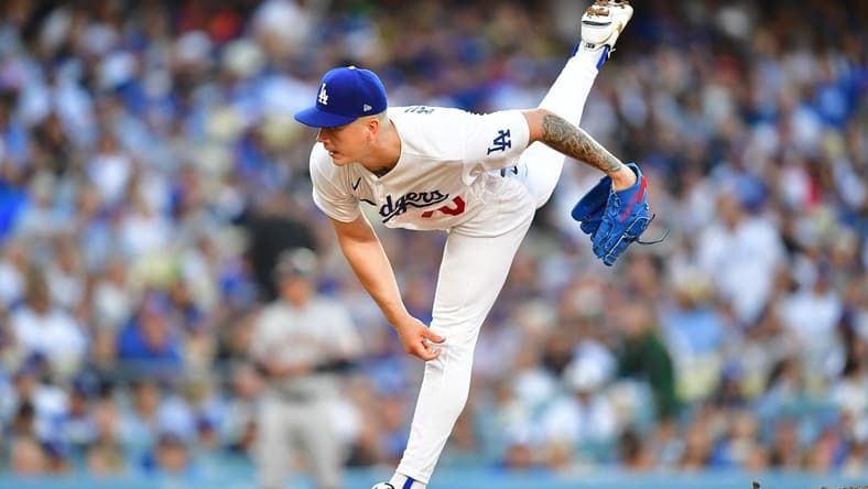 Jun 17, 2023; Los Angeles, California, USA; Los Angeles Dodgers starting pitcher Bobby Miller (70) throws against the San Francisco Giants during the fifth inning at Dodger Stadium. Mandatory Credit: Gary A. Vasquez-USA TODAY Sports