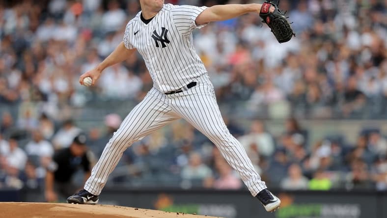 Jun 20, 2023; Bronx, New York, USA; New York Yankees starting pitcher Gerrit Cole (45) pitches against the Seattle Mariners during the first inning at Yankee Stadium. Mandatory Credit: Brad Penner-USA TODAY Sports