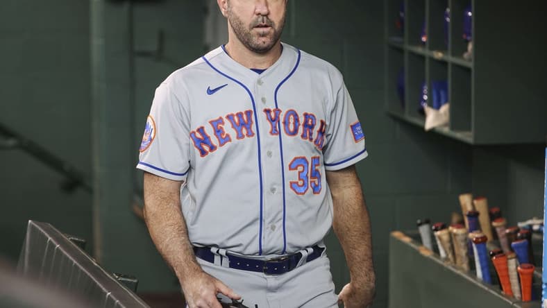 Jun 20, 2023; Houston, Texas, USA; New York Mets starting pitcher Justin Verlander (35) walks in the dugout before the game against the Houston Astros at Minute Maid Park. Mandatory Credit: Troy Taormina-USA TODAY Sports
