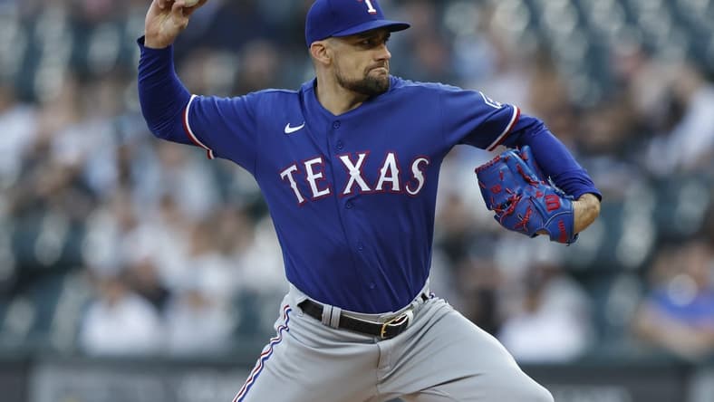 Jun 20, 2023; Chicago, Illinois, USA; Texas Rangers starting pitcher Nathan Eovaldi (17) pitches against the Chicago White Sox during the first inning at Guaranteed Rate Field. Mandatory Credit: Kamil Krzaczynski-USA TODAY Sports